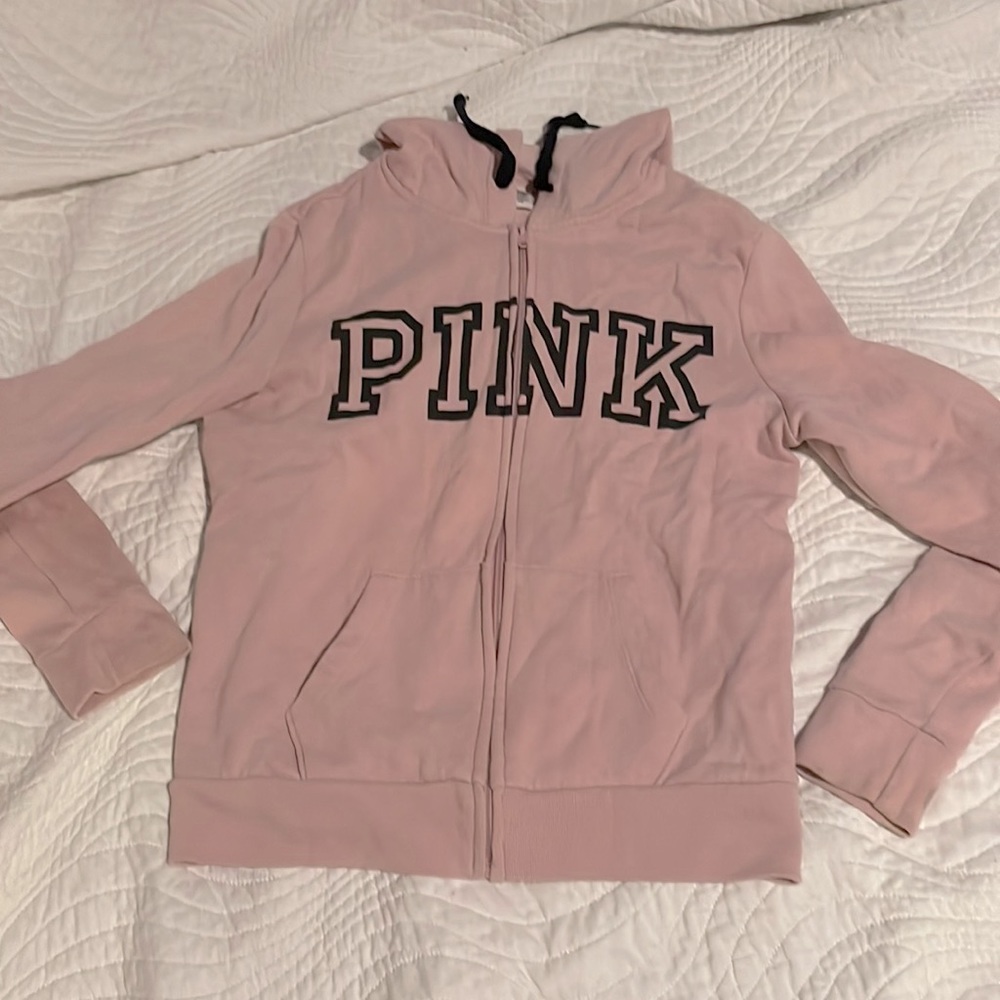 Im selling a Pink zip up worn four times.